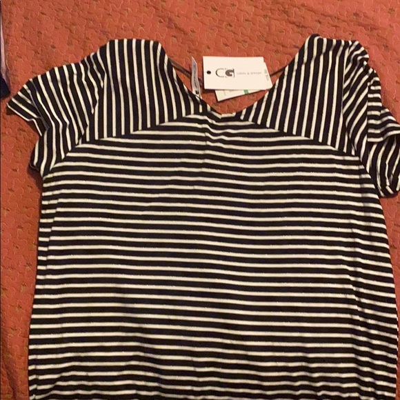 A black and white stripped t-shirt. - Picture 3 of 3